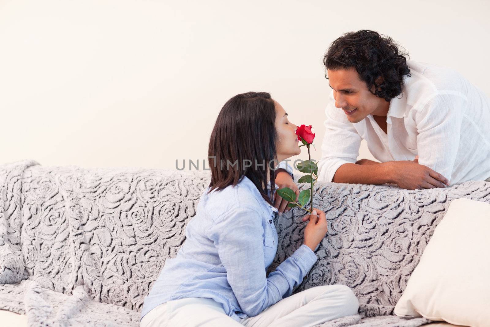 Young couple celebrating valentines day in the living room