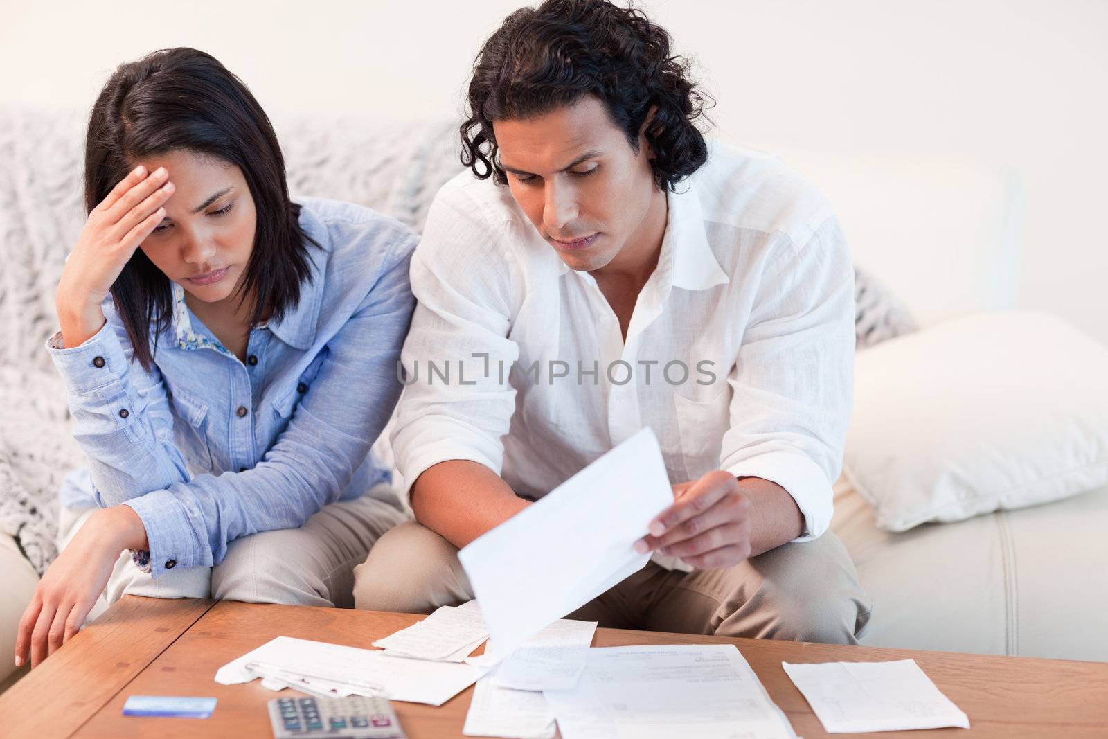 Young couple depressed about financial problems