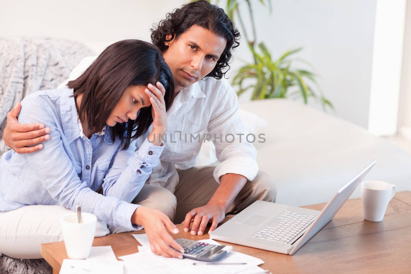 Young couple worried about their finances