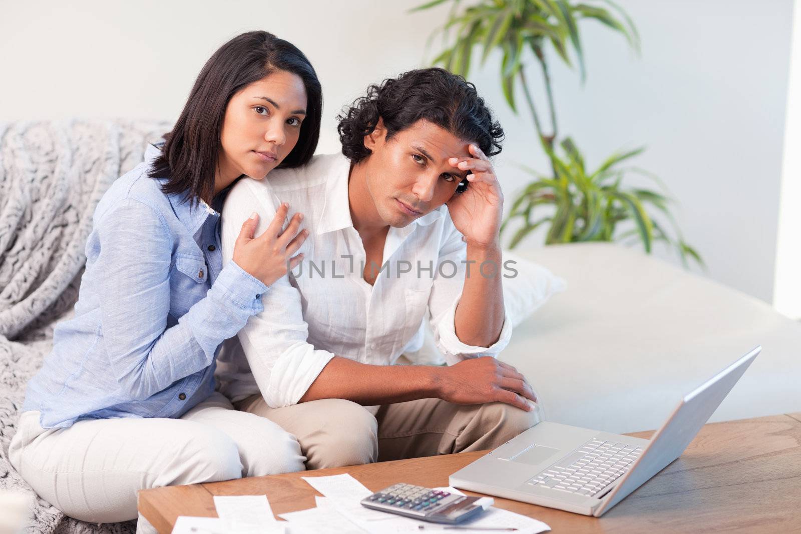 Frustrated young couple underestimated their spending
