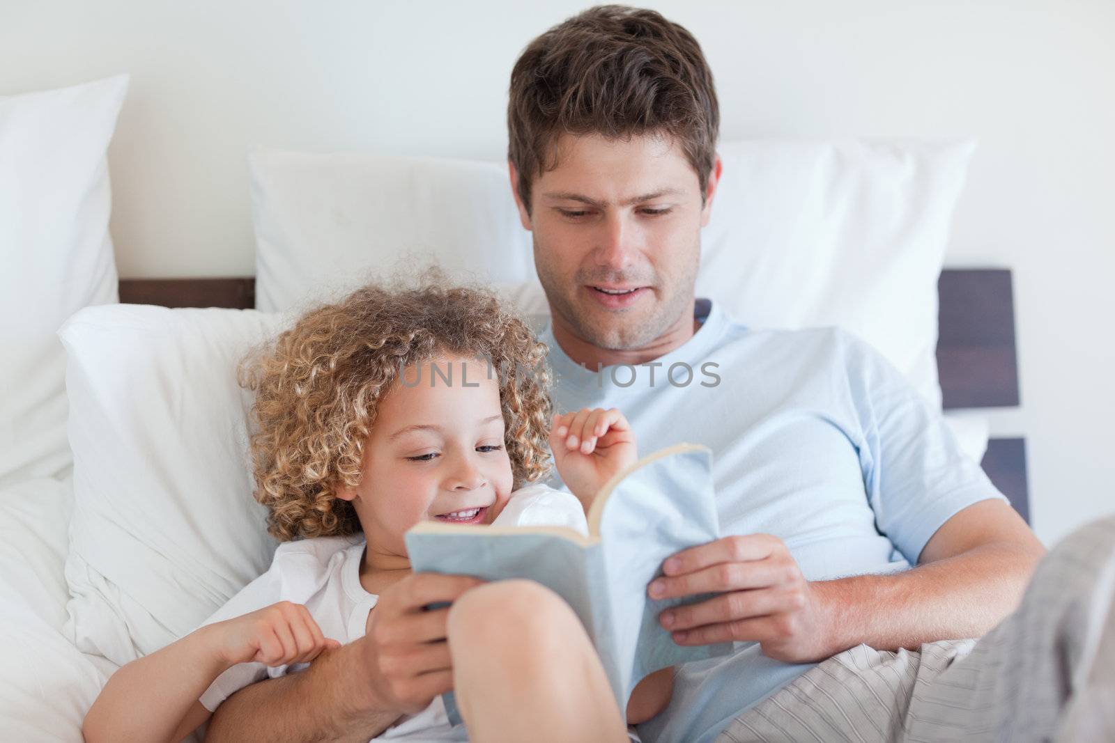 Father reading a story for his child
