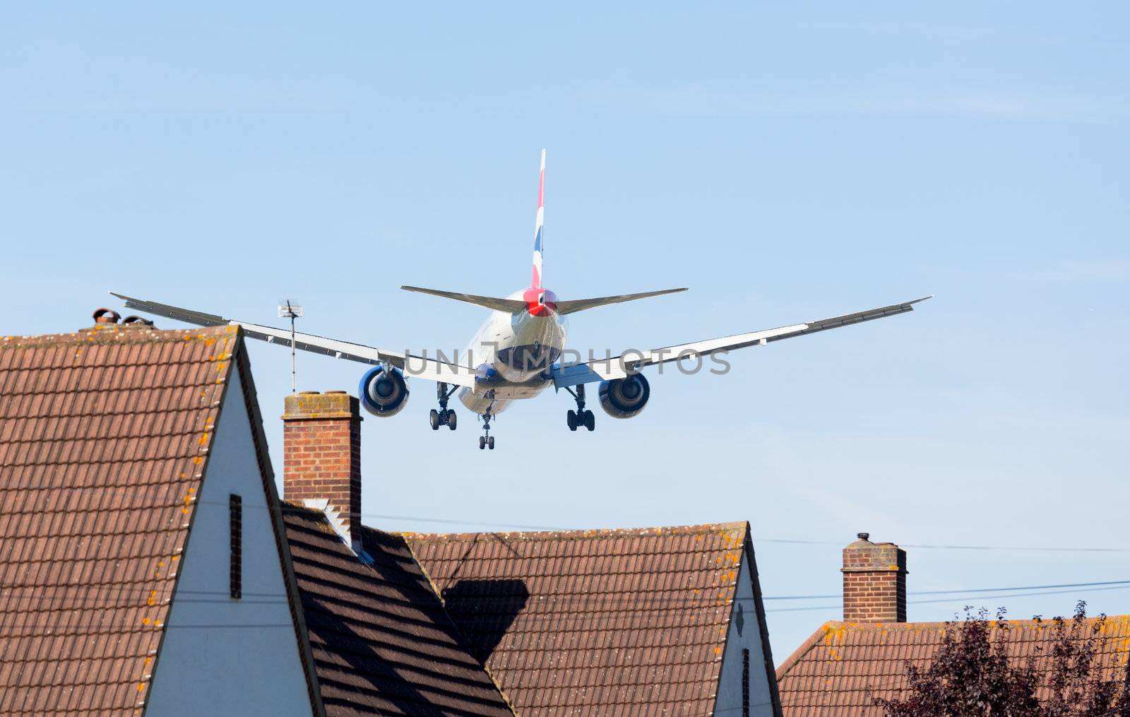 HEATHROW AIRPORT, LONDON - 9 SEPTEMBER: British Airways Boeing 777 approaches Heathrow on 9 September 2012. London Heathrow is the third busiest airport in the world.