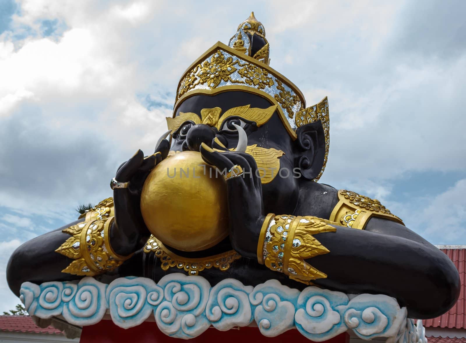 Statue of Rahu, god of the Indian. Generality in Thailand, any kind of temple, art decorated in Buddhist church, temple etc. created with money donated by people to hire artist. They are public domain, no restrict in copy or use.This photo is taken under these conditions.