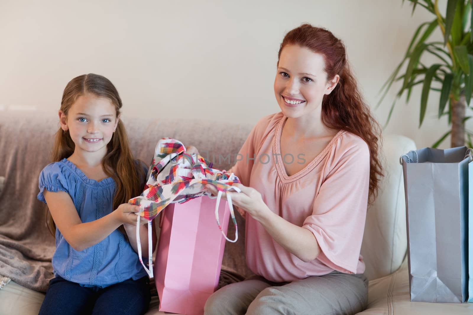 Mother and daughter with their shopping