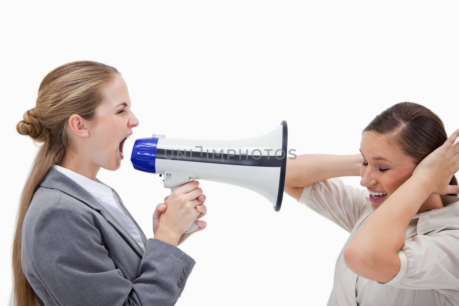 Manager yelling at her coworker through a megaphone against a white background
