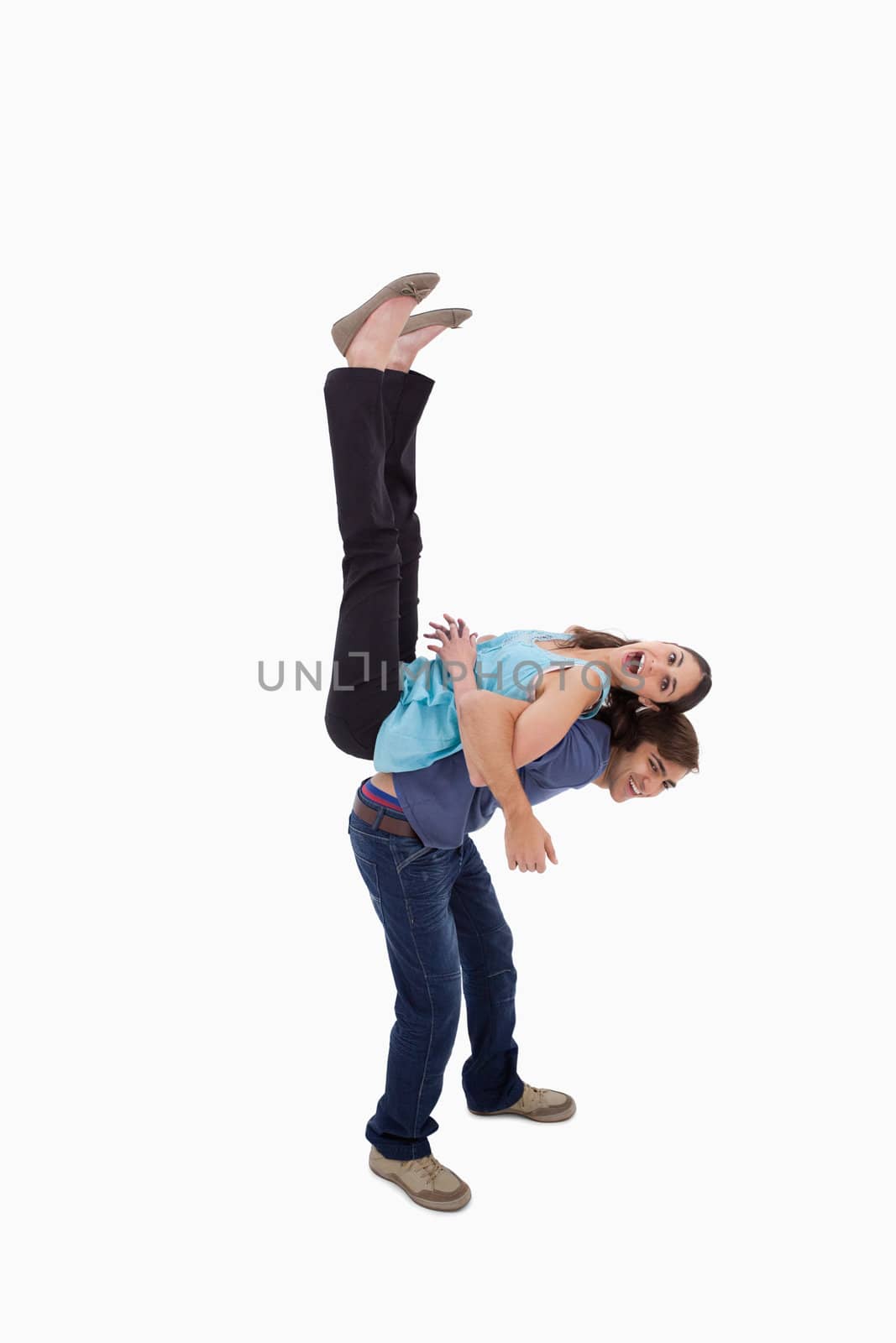 Portrait of a couple having fun together against a white background