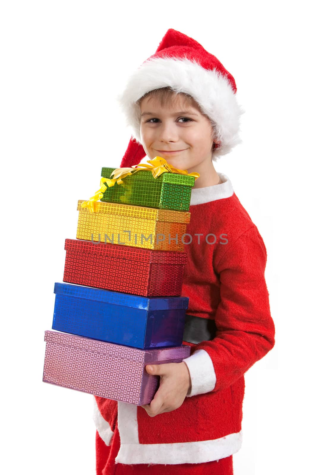 Boy holding a christmas gift isolated on white background