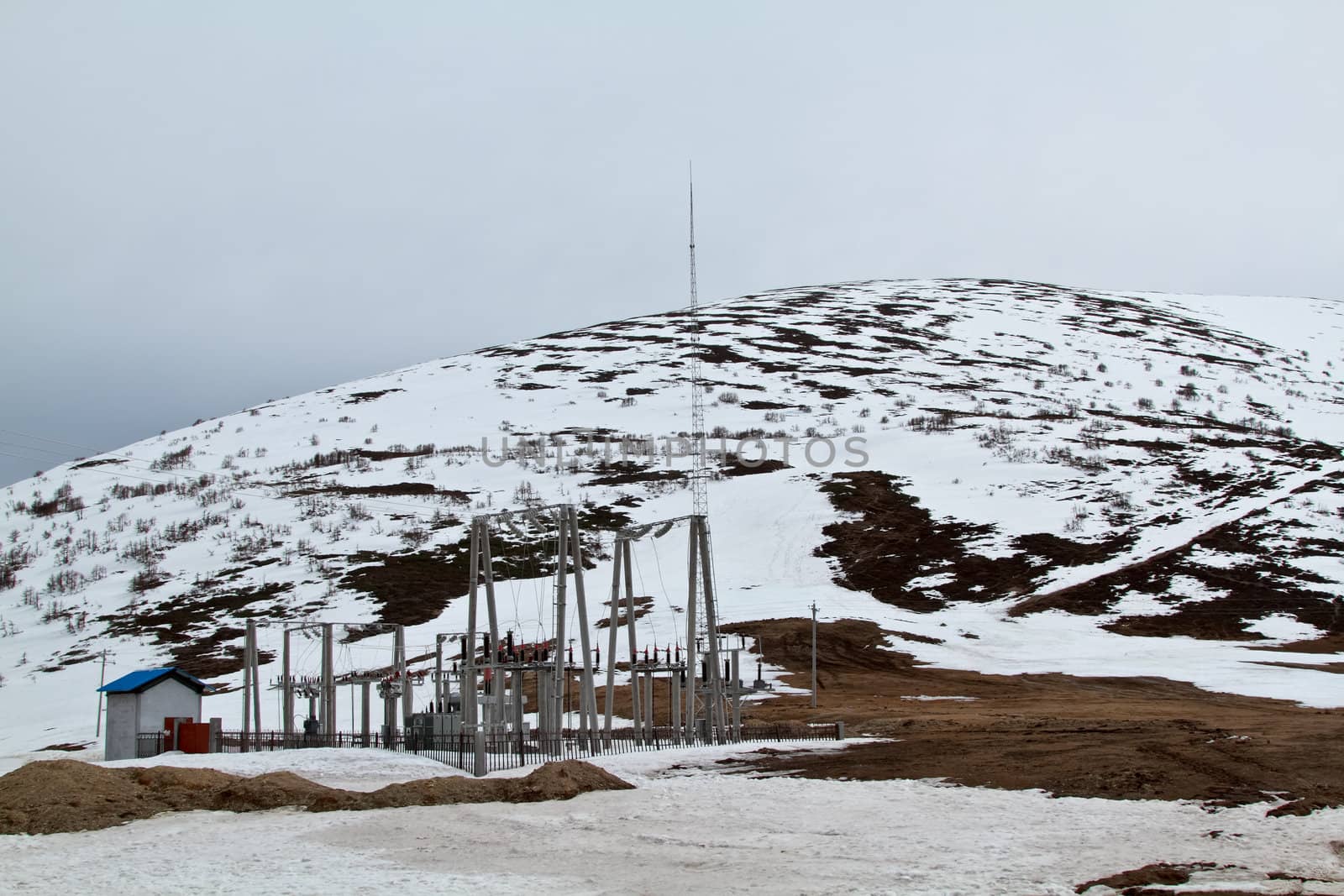 Power plant station in mountain with snow