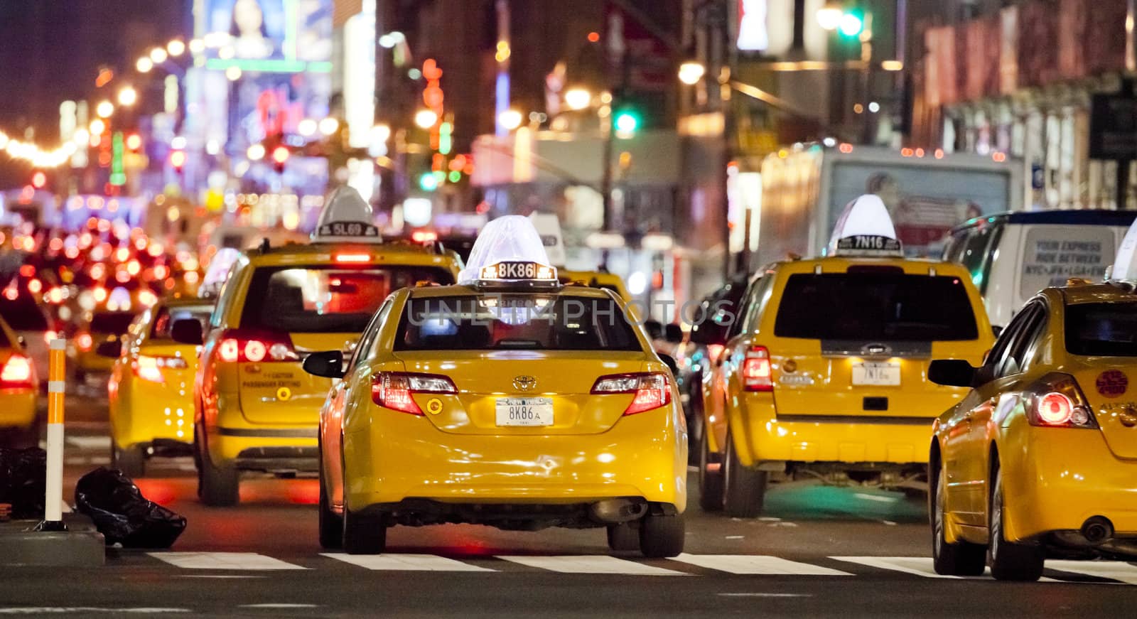NEW YORK CITY - SEPT 22: Eight Avenue, featured with Taxi Cabs by hanusst