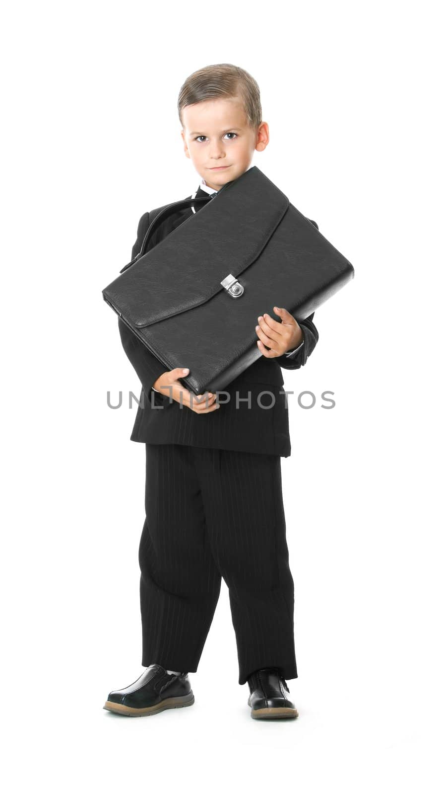Boy holding a briefcase isolated on white background