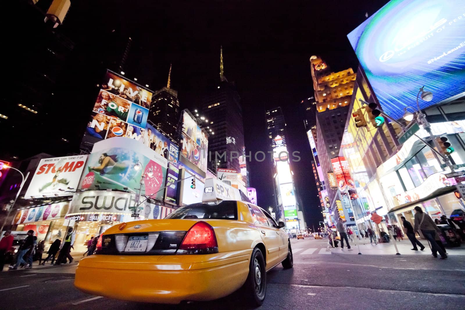 NEW YORK CITY - SEPT 26: Times Square, featured with Broadway Theaters, Taxi Cabs and animated LED signs, is a symbol of New York City and the United States, September 26, 2012 in Manhattan, New York City