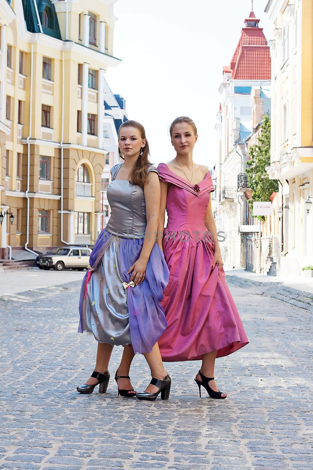 Two girls in dresses in the city, Kiev, Ukraine