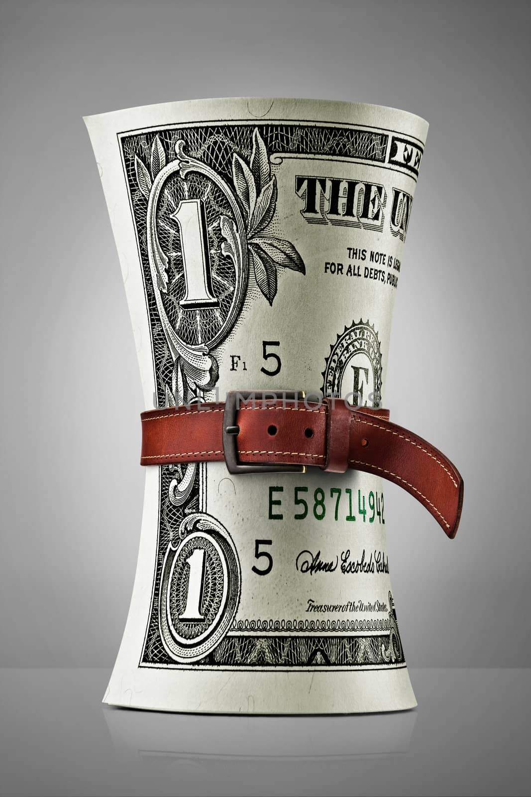 Belted role of dollars with clipping