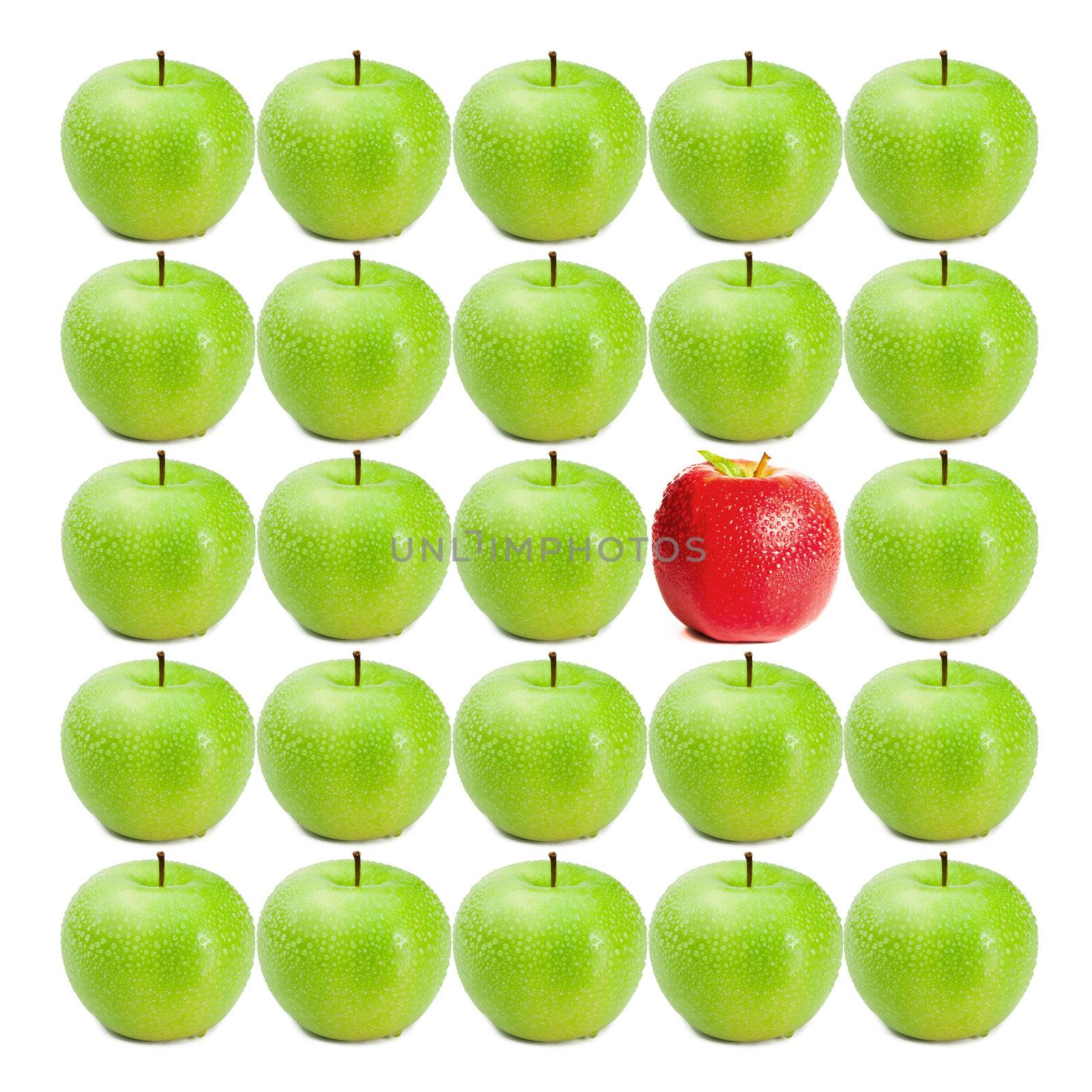 Green wet apples surrounding red apple on white background