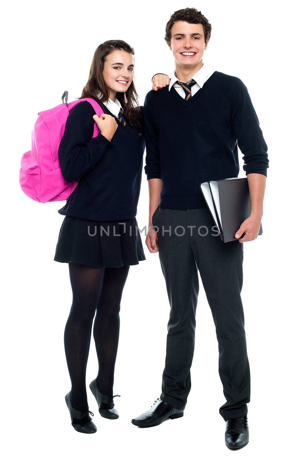 Full length snap shot of cheerful classmates posing together