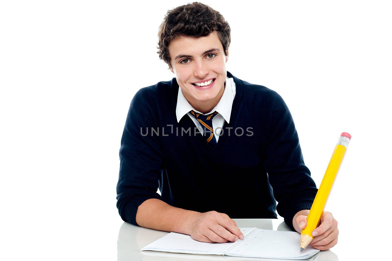 Smiling attractive youngster kid studying isolated over white background