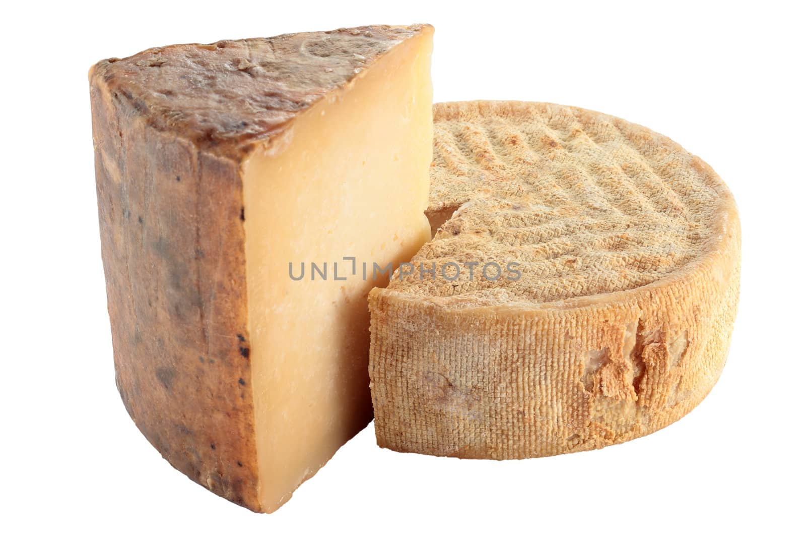 portion in cradle of sheep's cheese inside of a goat's cheese and isolated with clipping path