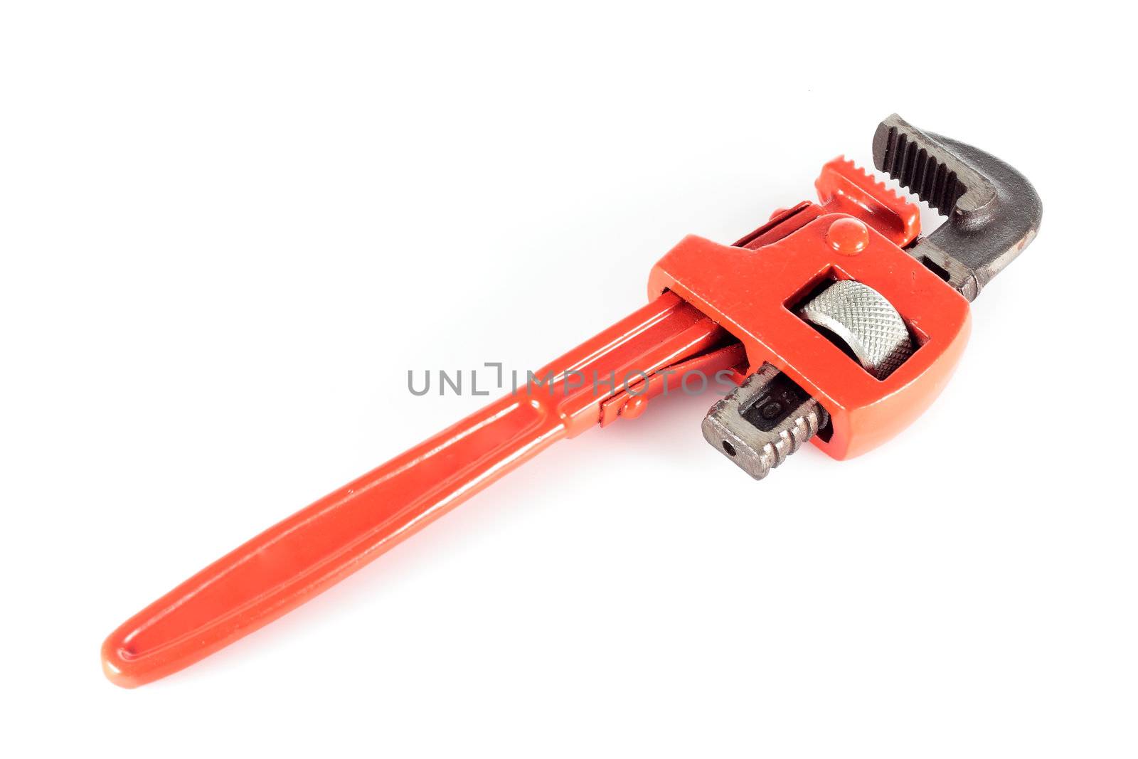 adjustable spanner colored red for plumbing isolated on fund in horizontal
