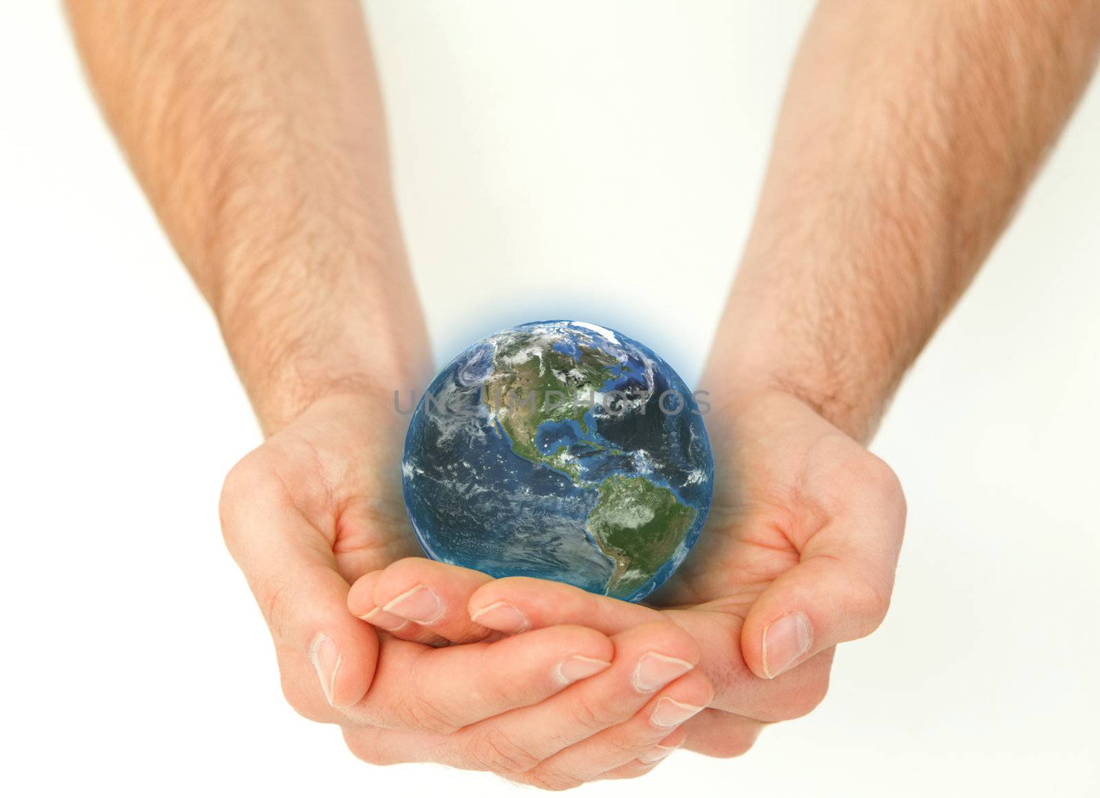Masculine hands holding a planet globe against a white background