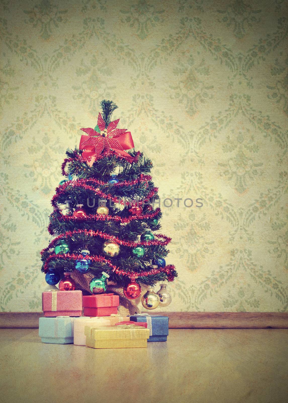 Vintage image, Christmas tree with gifts on decorative wallpaper