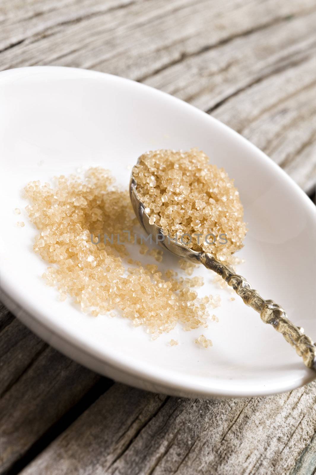 a Sugar spoon with brown sugar by tish1