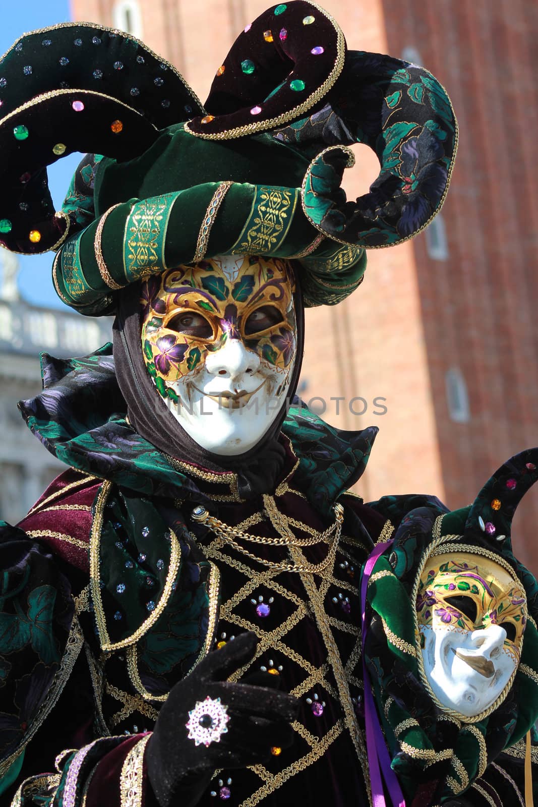 Funny gaze on the green joker mask. Venice carnival 2012 