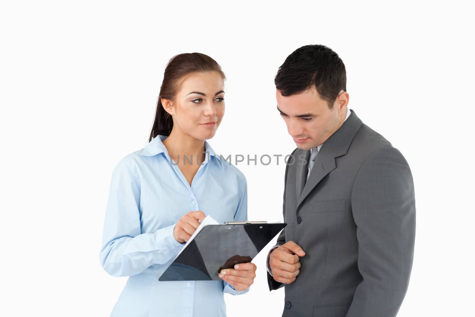 Businesswoman explaining data to her partner against a white background