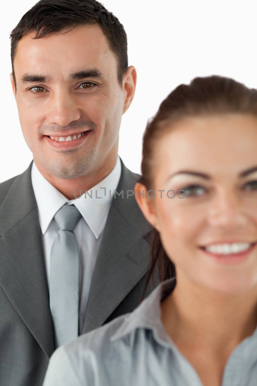 Close up of business team against a white background