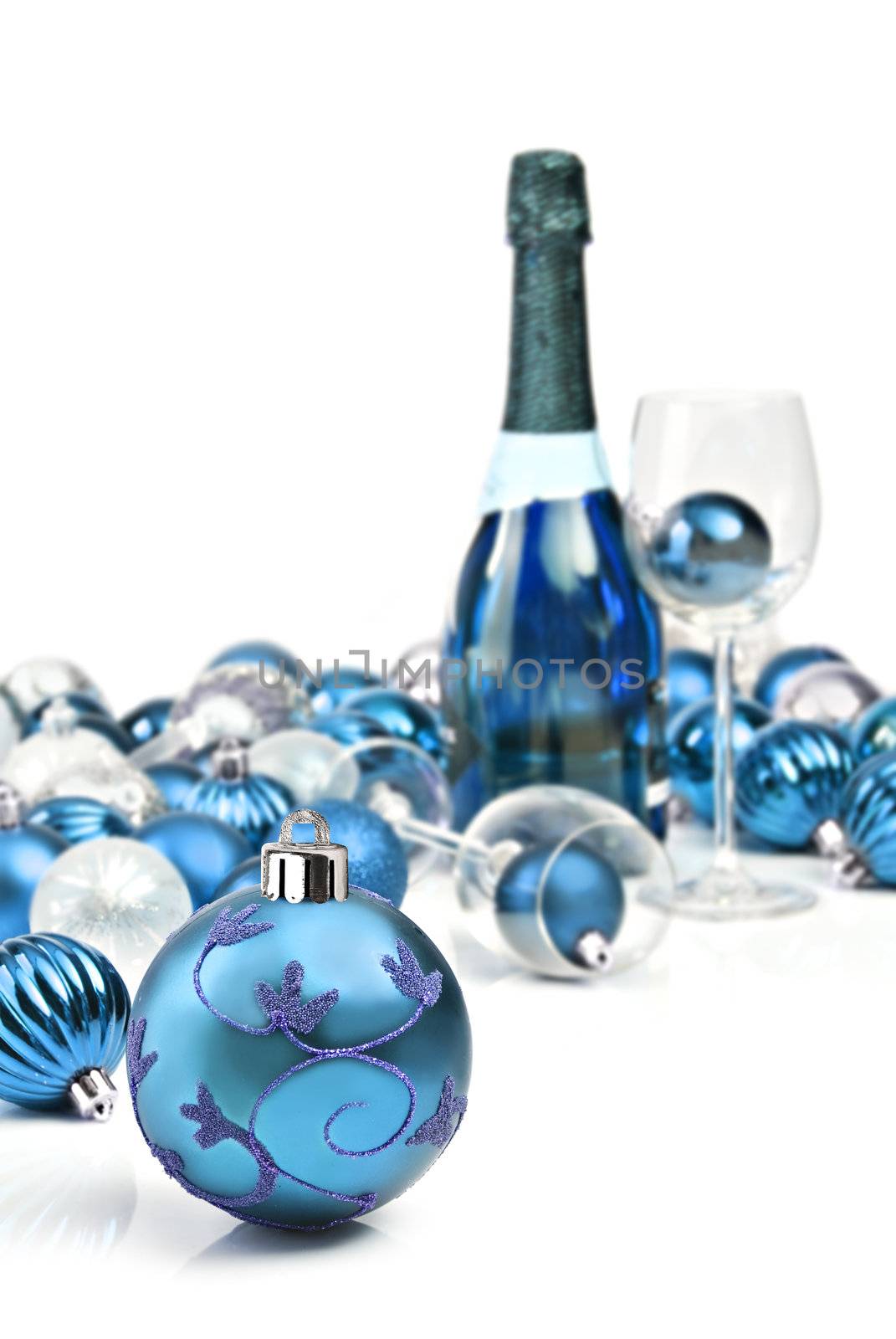 Blue Christmas ornaments with a bottle of sparkling wine by tish1