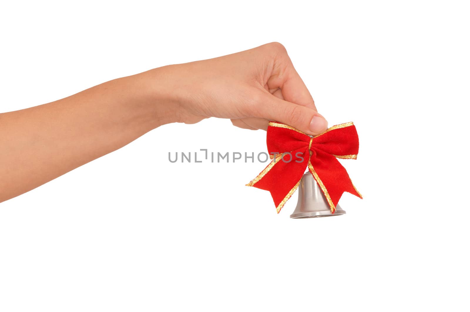 hand bell with red bow in the woman's hand for ringing