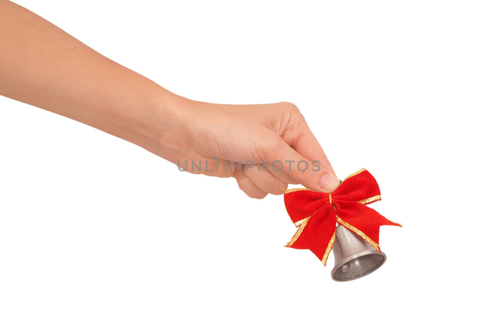 hand bell in the woman's hand for ringing