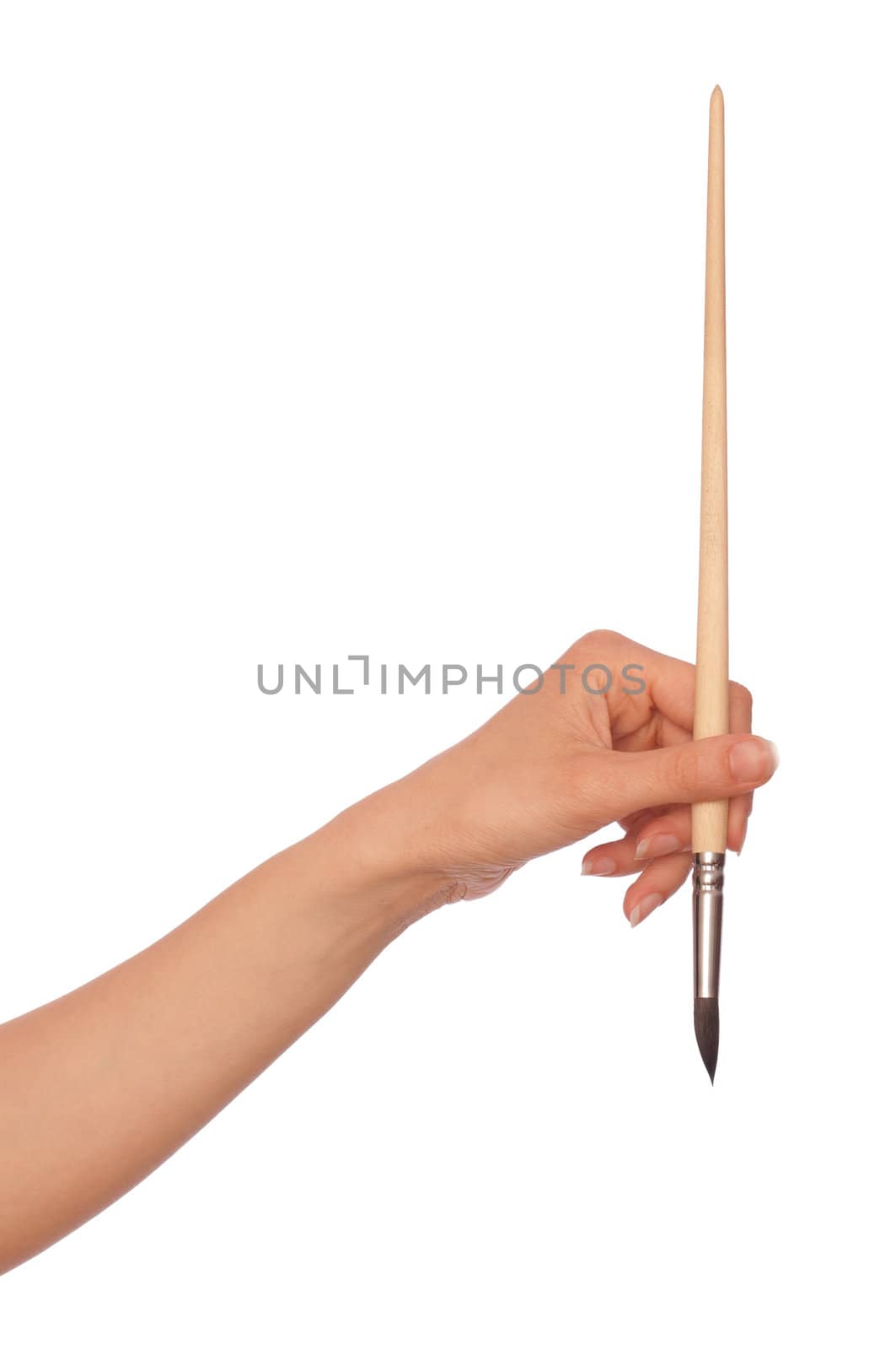 woman drawing a picture with a brush