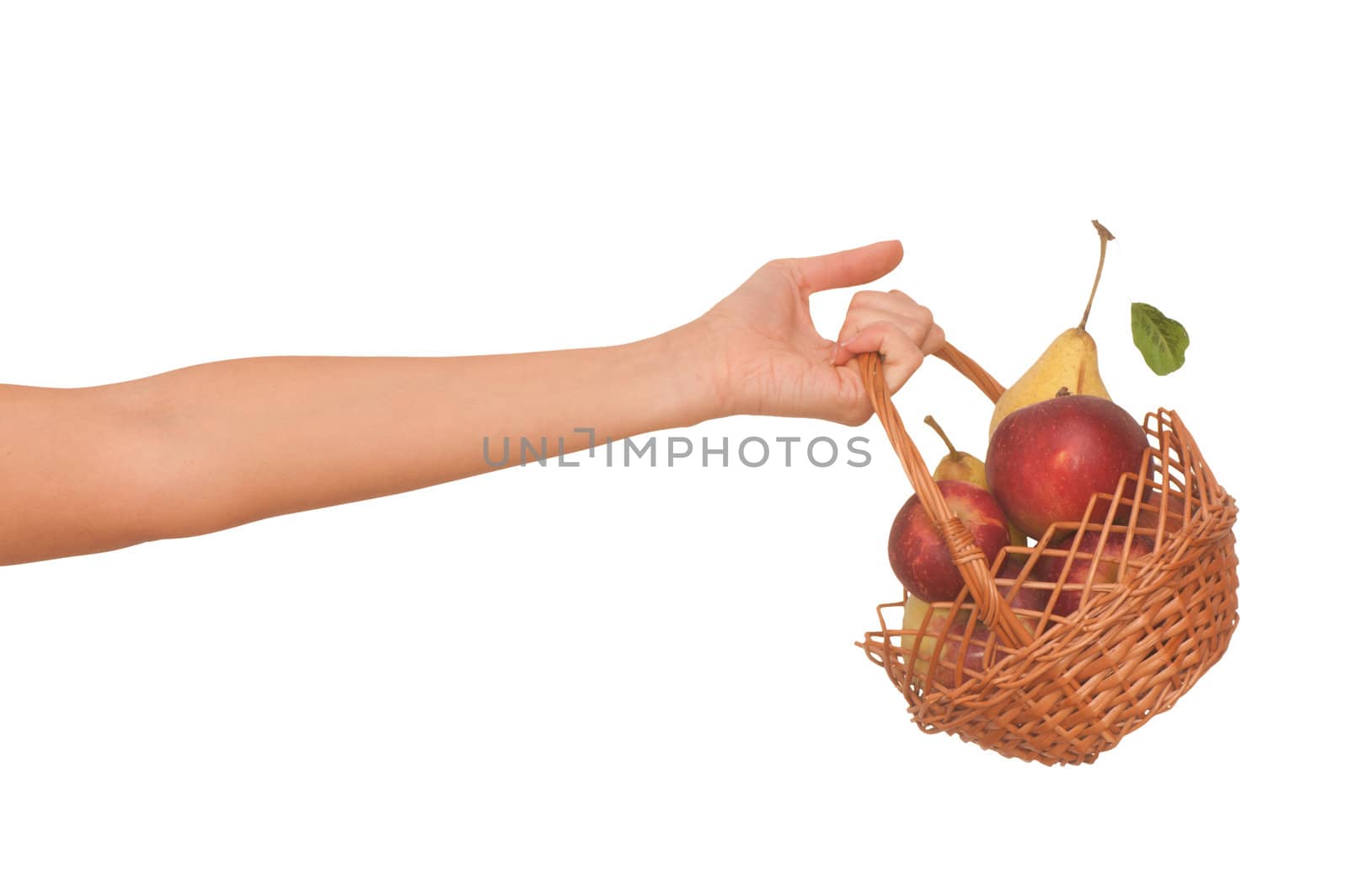 Basket with yellow pears and red apples from supermarket