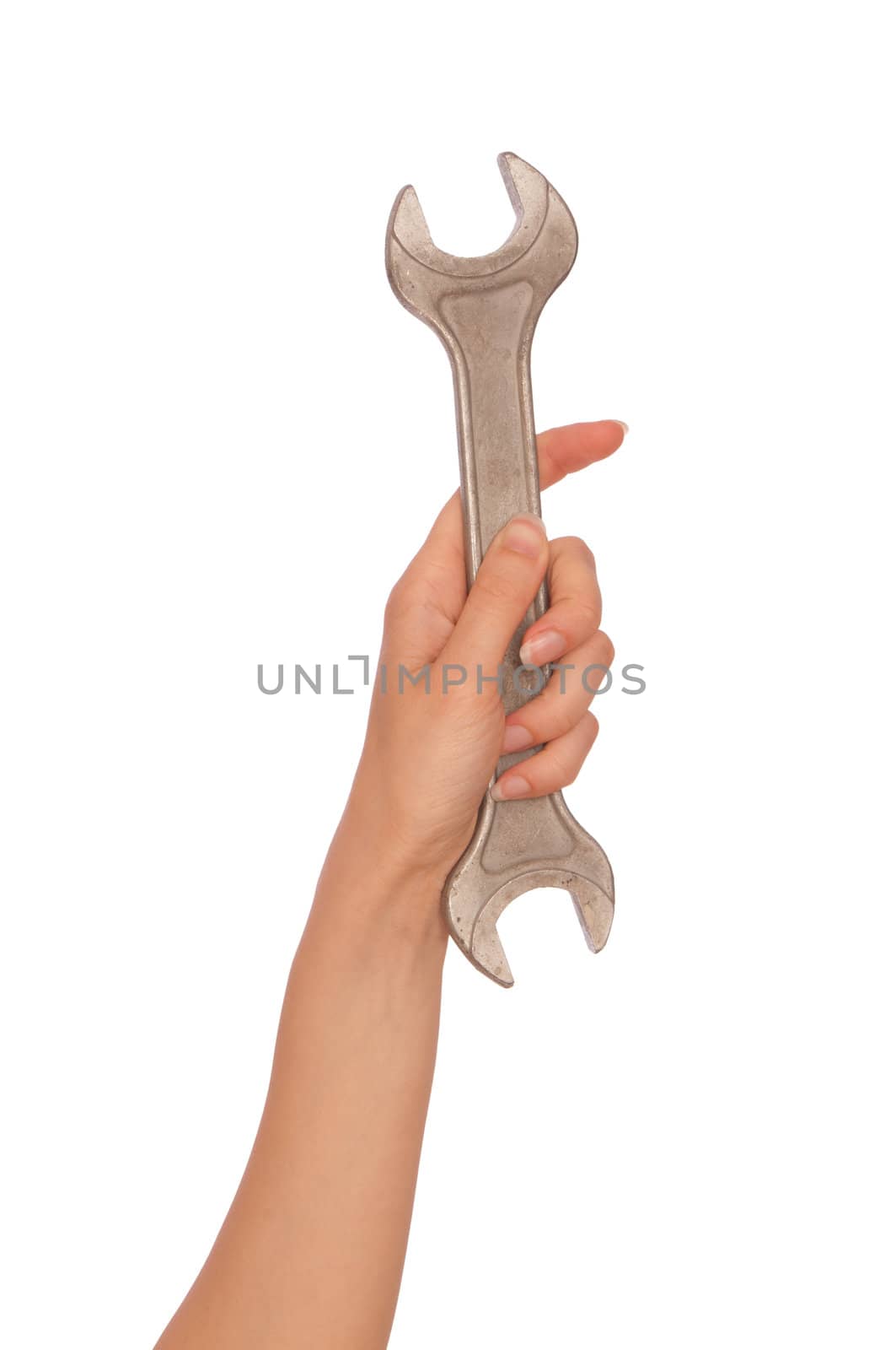 woman holding big spanner in the hands