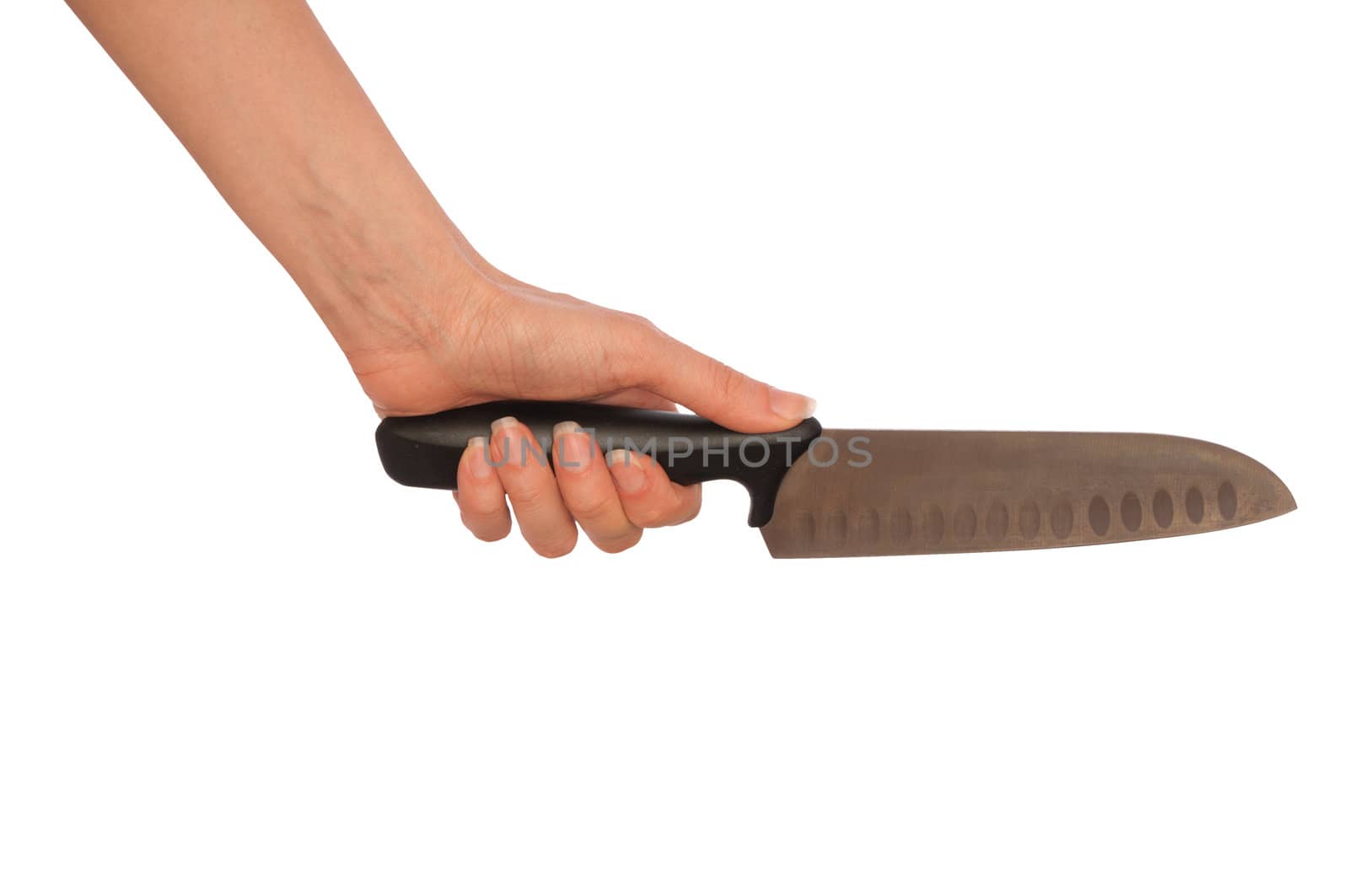 woman cooking on the kitchen with knife