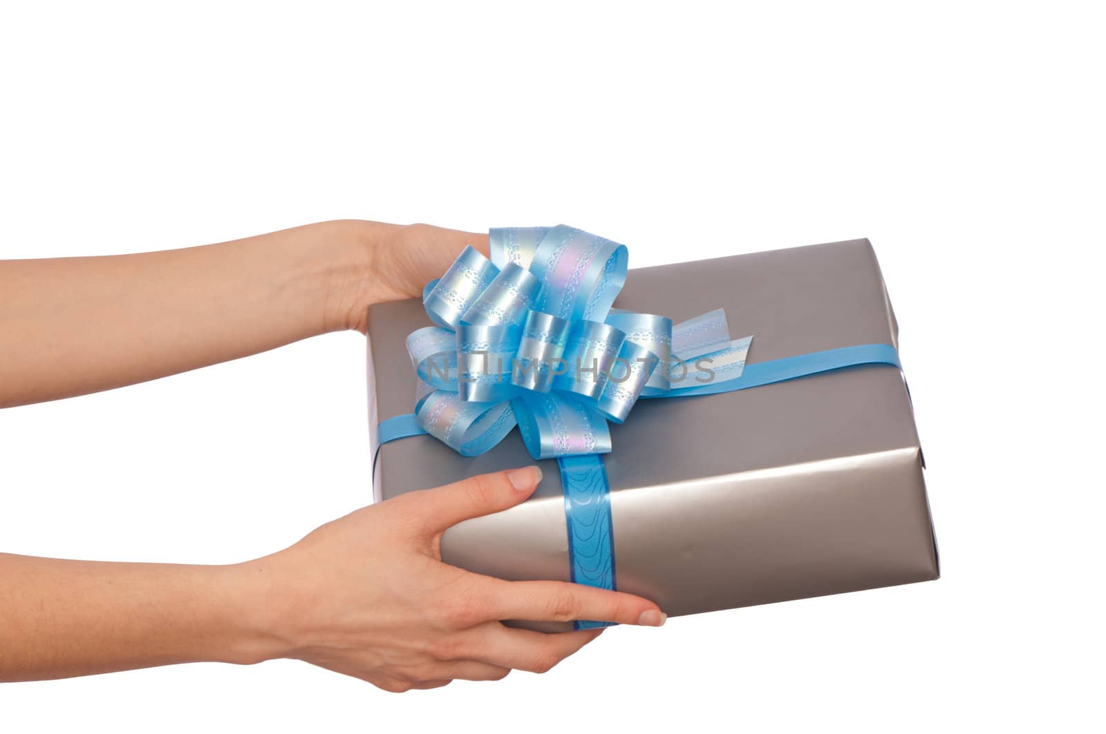 woman giving a silver box with blue bow as a gift