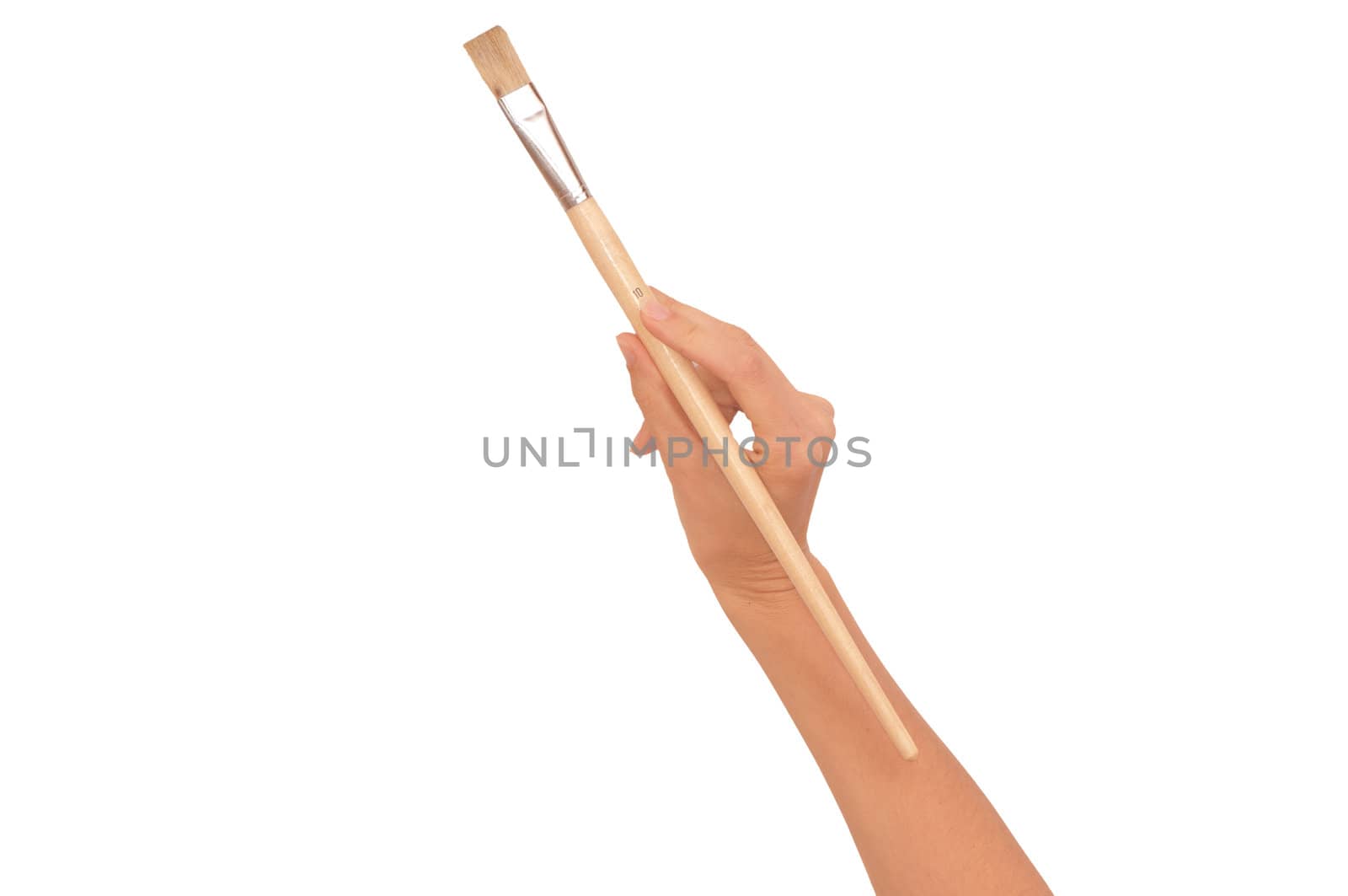 woman paints a picture with a white brush