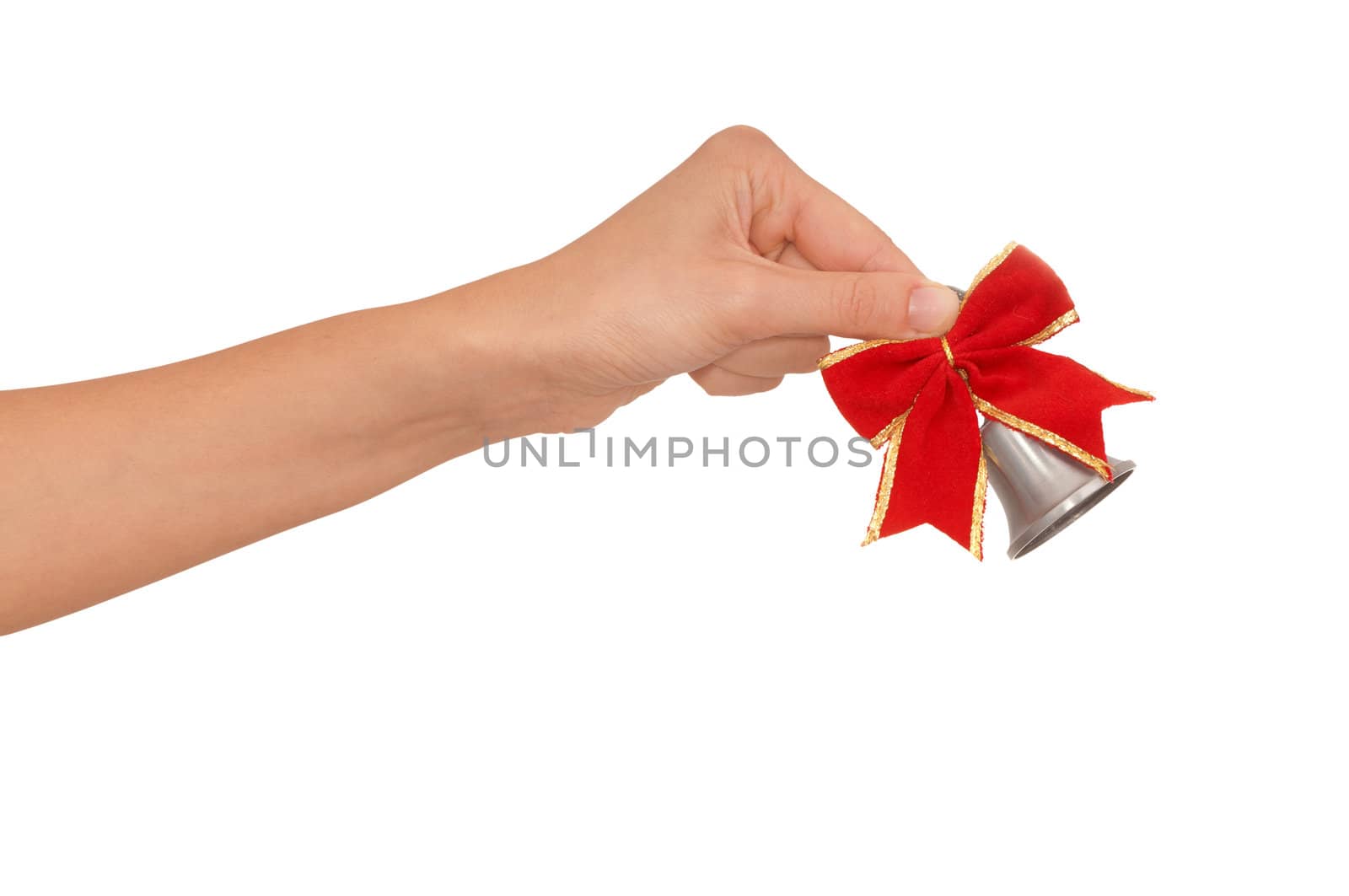hand bell in the woman's hand for ringing