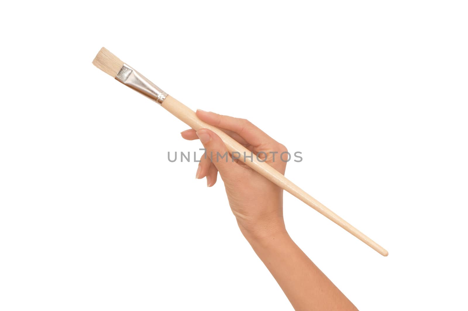 woman paints a picture with a brush