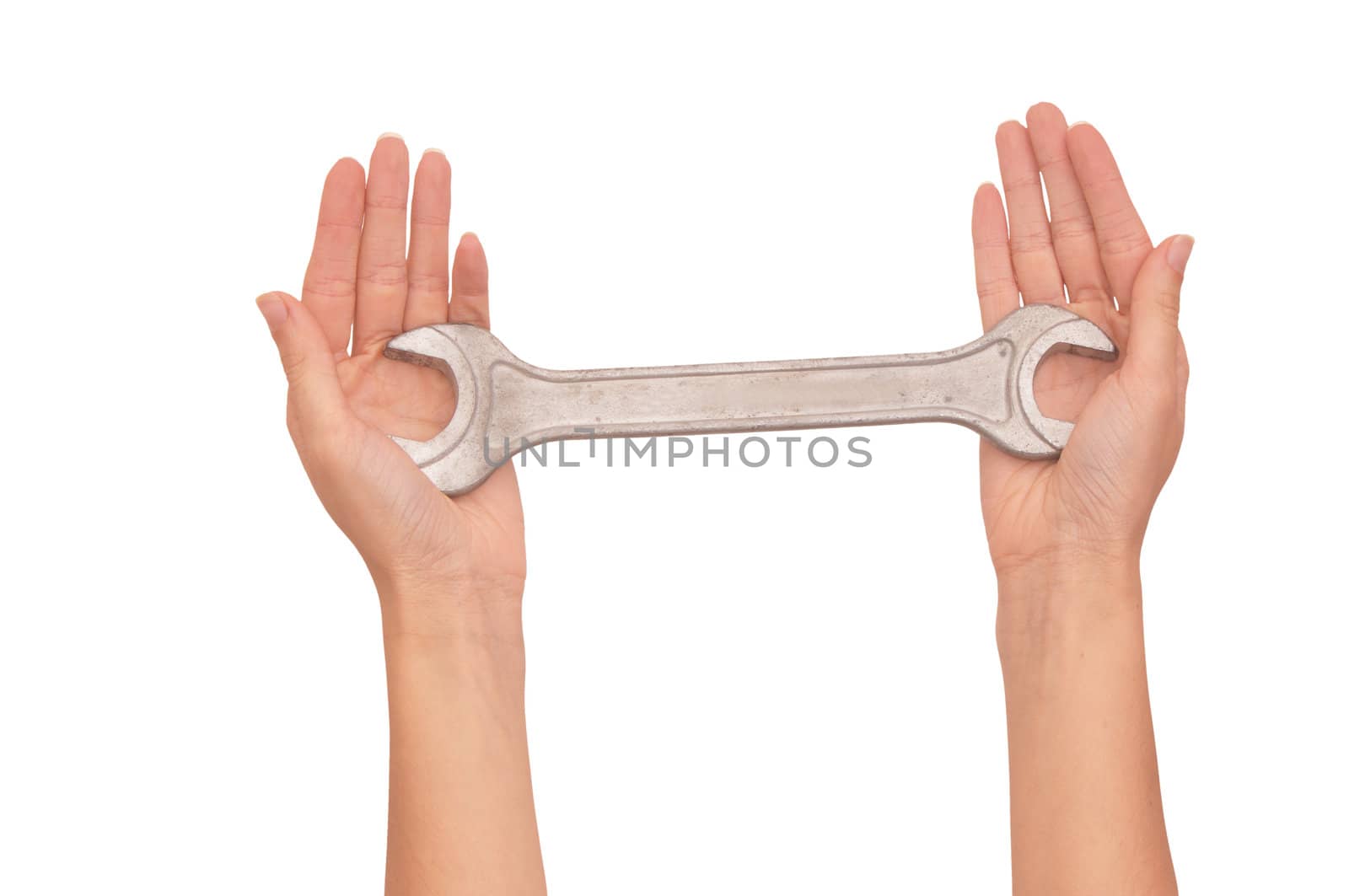 woman holding chrome vanadium spanner in the hands