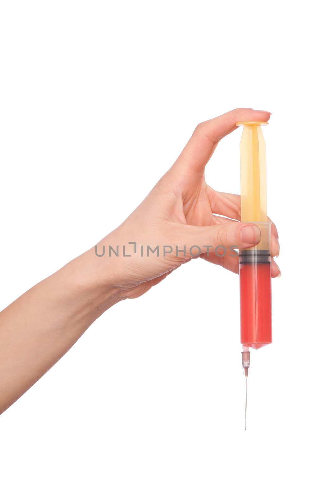 Woman holds in the hand syringe with a new antibiotic mixed with blood