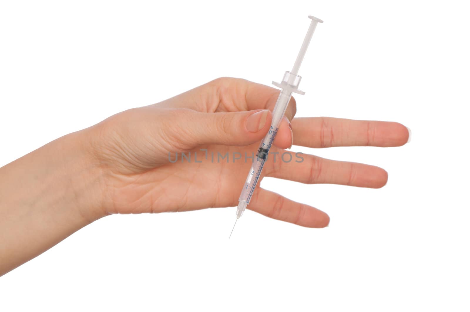 syringe in the woman's hand for making insulin injections