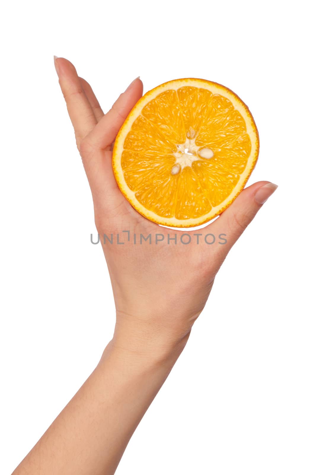 Slice of a fresh Sicilian orange in the hand