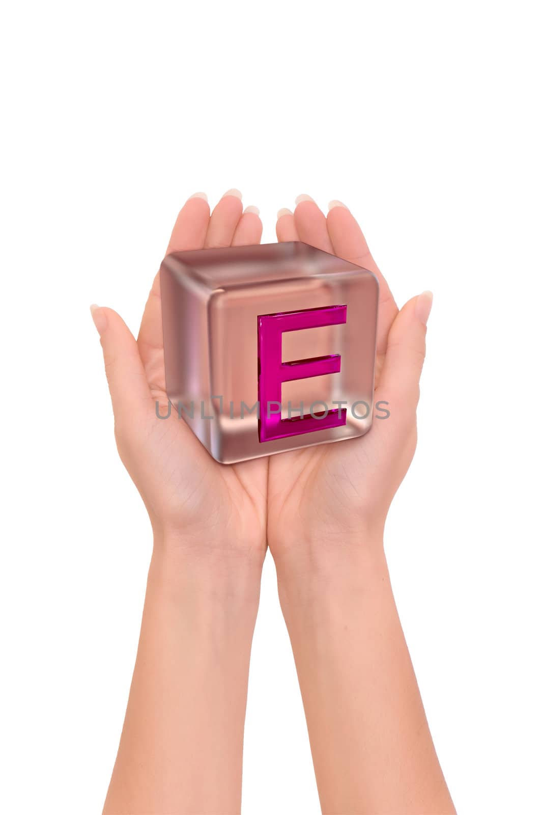 The glass cube with letter E lies in hands