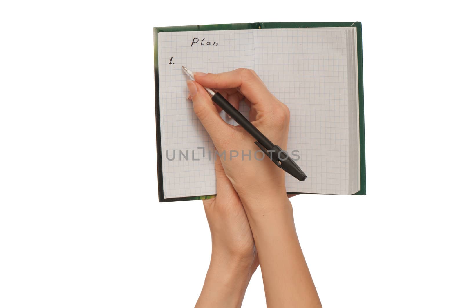 business woman writes notes for business plan
