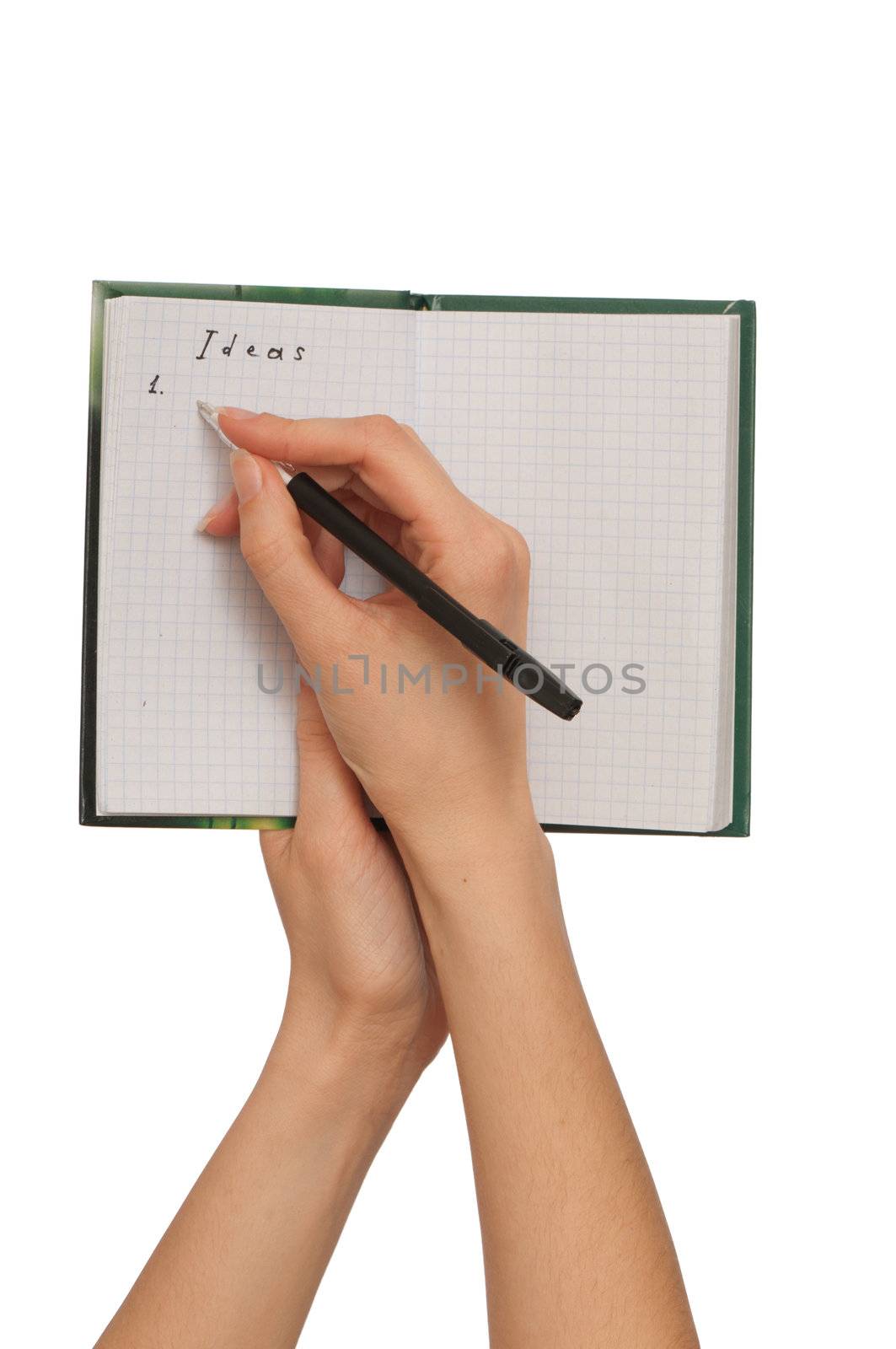 business woman writes ideas for business plan