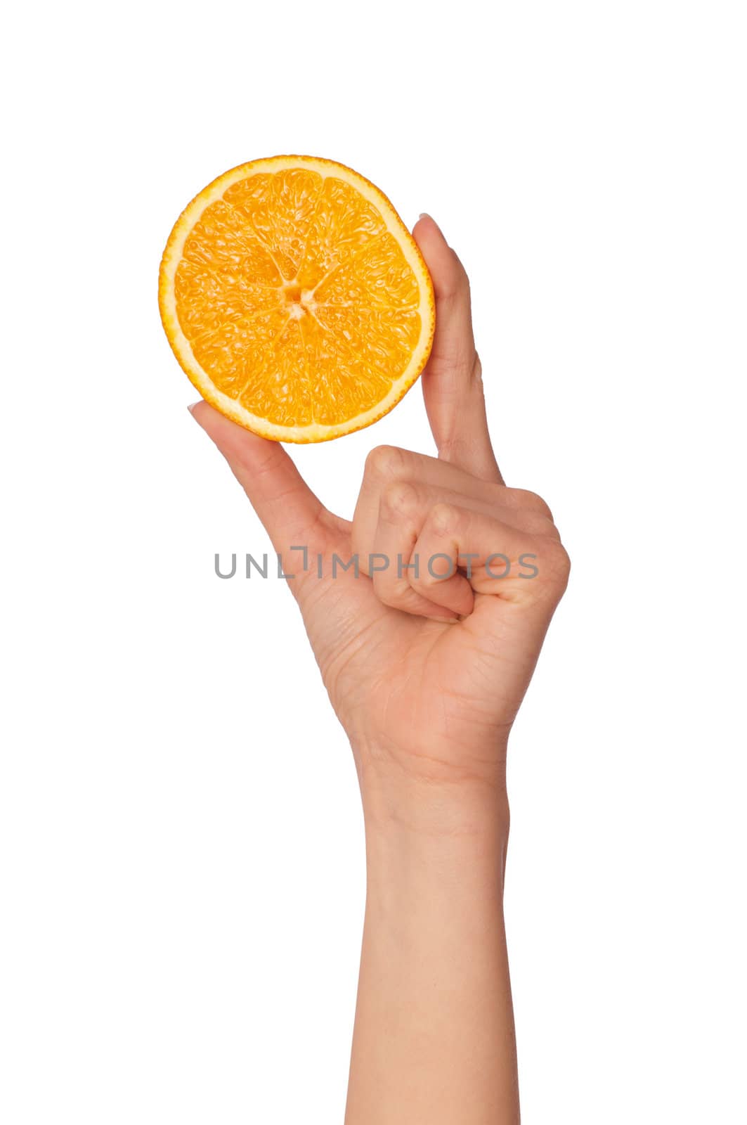 Slice of a fresh Sicilian orange in the hand