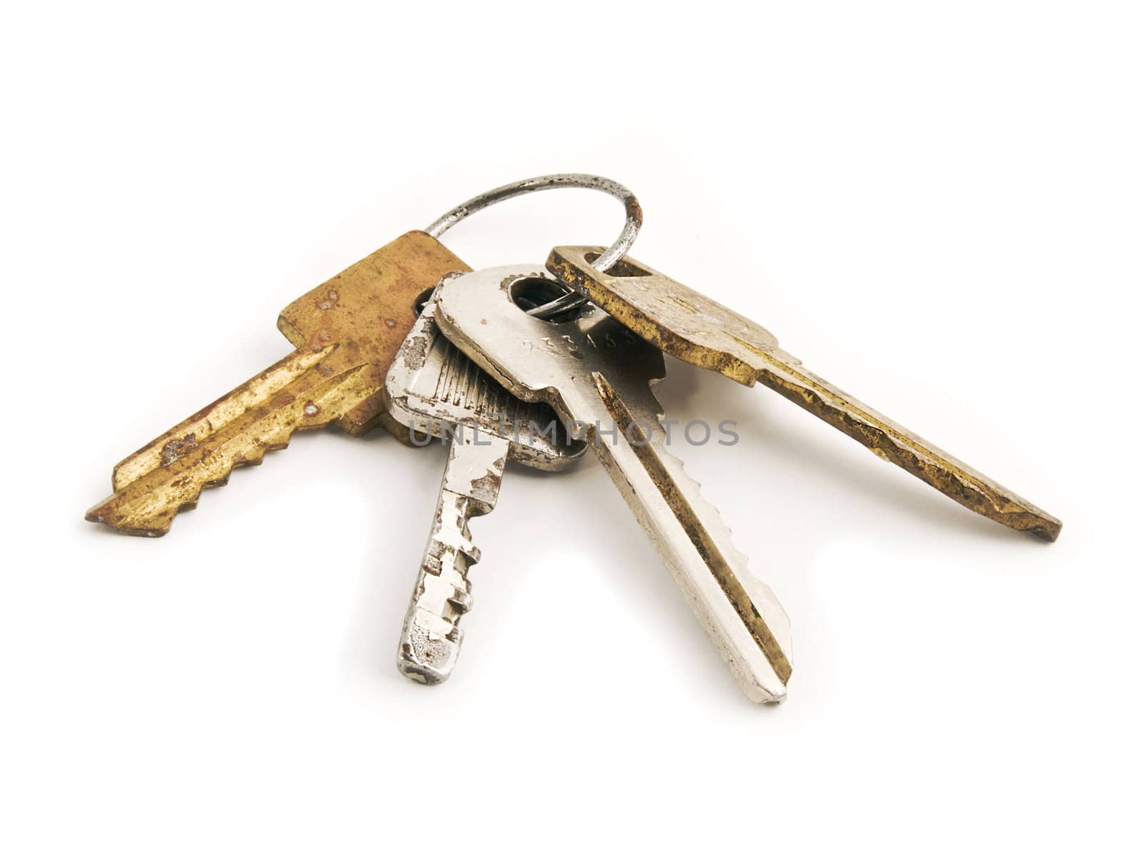 Old rusty keys isolated on white background. Close-up