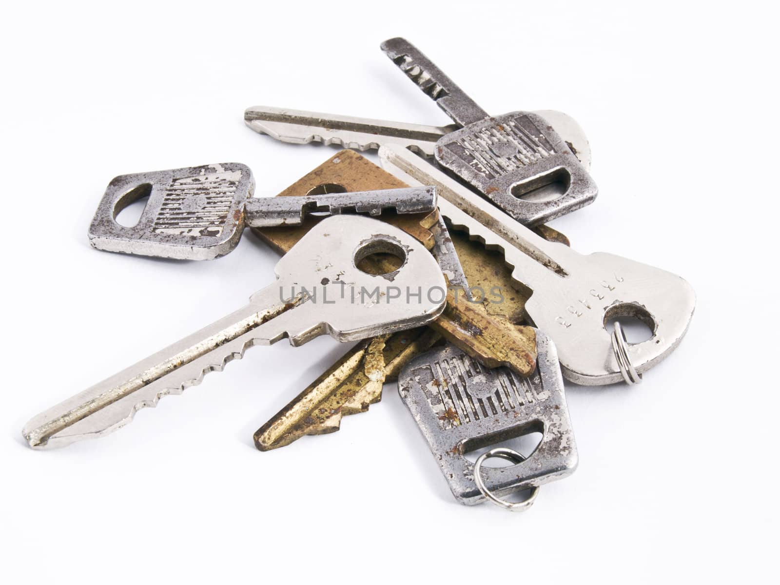 Old rusty keys isolated on white background