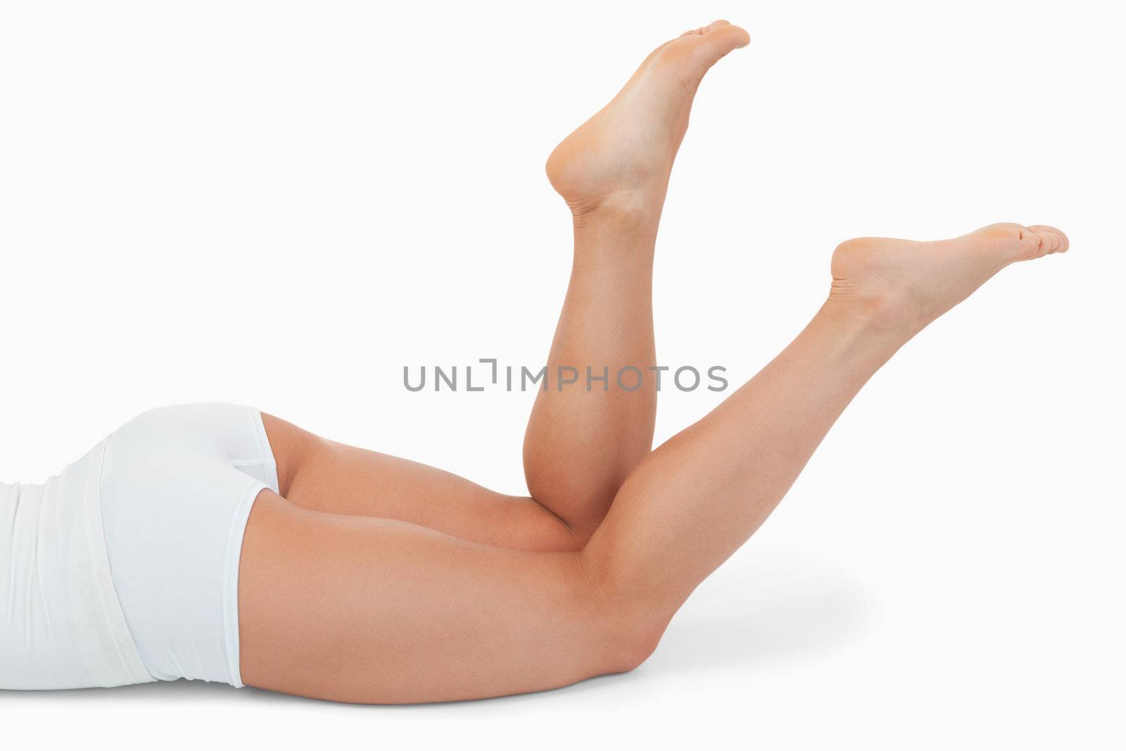 Portrait of a feminine body against a white background